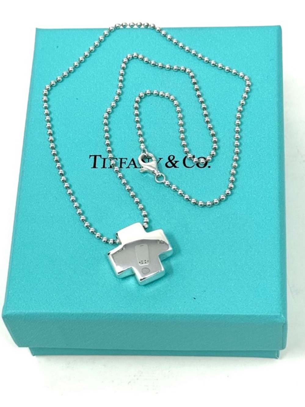 Authentic Tiffany & CO. Square Roman Cross Pendant Necklace.